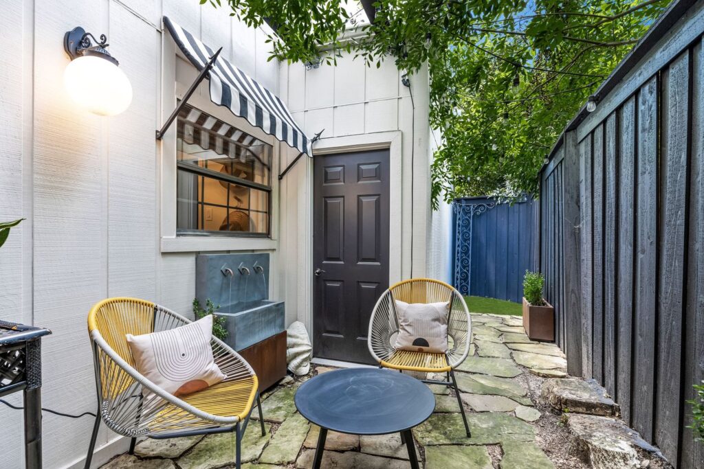 One of the charming courtyard areas featuring a peaceful water feature. 