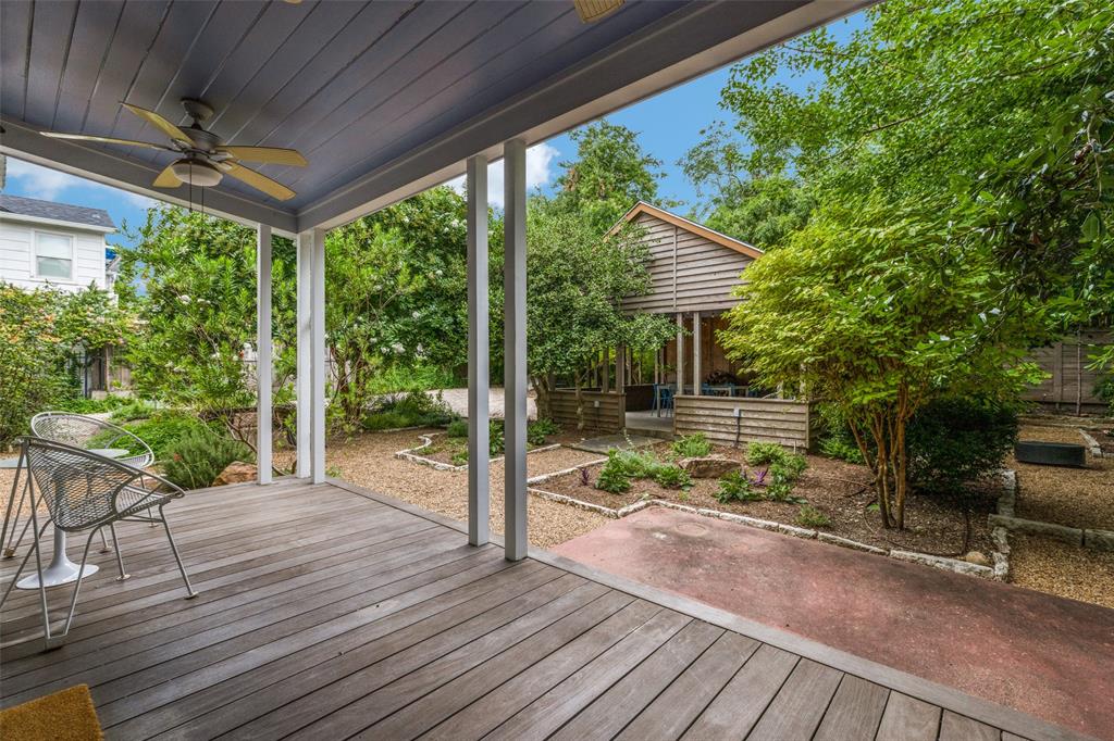 Garden views from the covered back porch. (Photo by Micalizzi Real Estate)