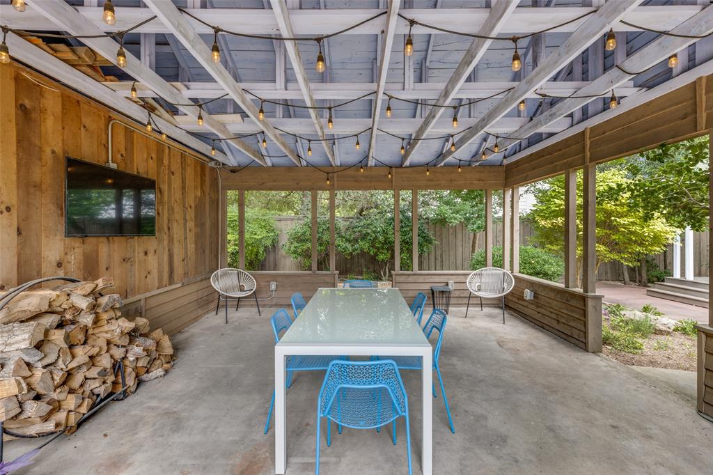 A covered pergola makes the most of the gorgeous backyard.  (Photo by Micalizzi Real Estate)