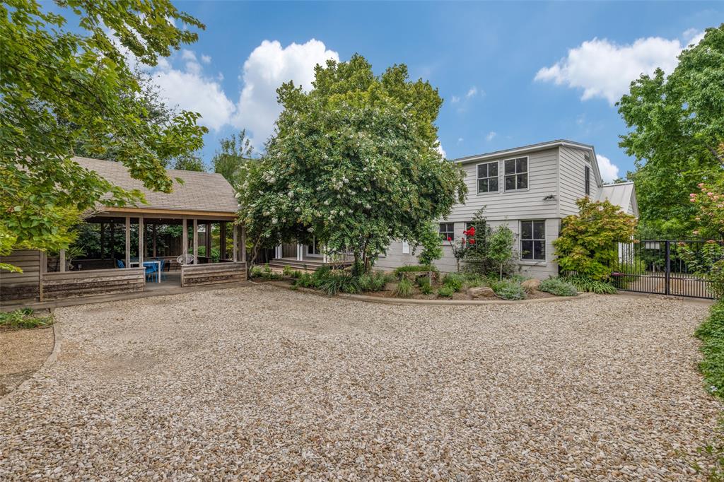 A view beyond the backyard gate.  (Photo by Micalizzi Real Estate)