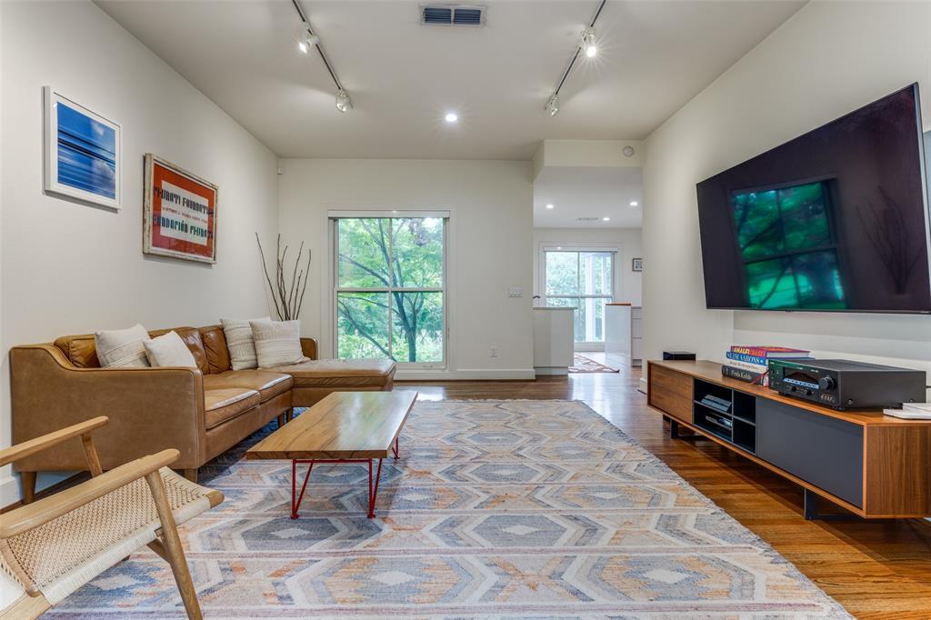 A living area with verdant views.  (Photo by Micalizzi Real Estate)
