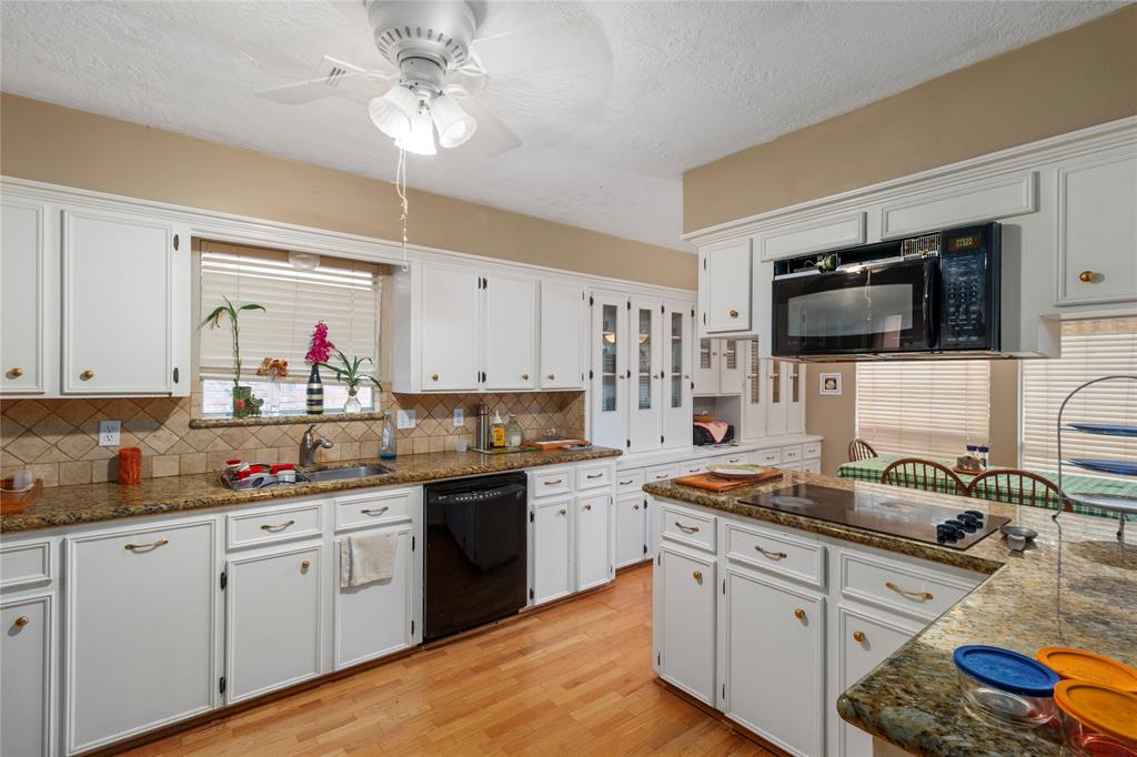 The cozy kitchen inside 2825 S Logrun Circle is a great place for entertaining. 
