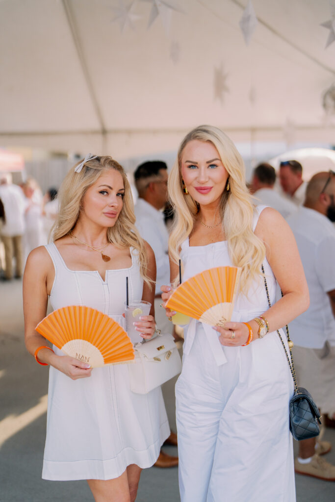 Linda Hene, Sterling Brogan at Nan & Company Properties' White Linen Night in The Heights soirée