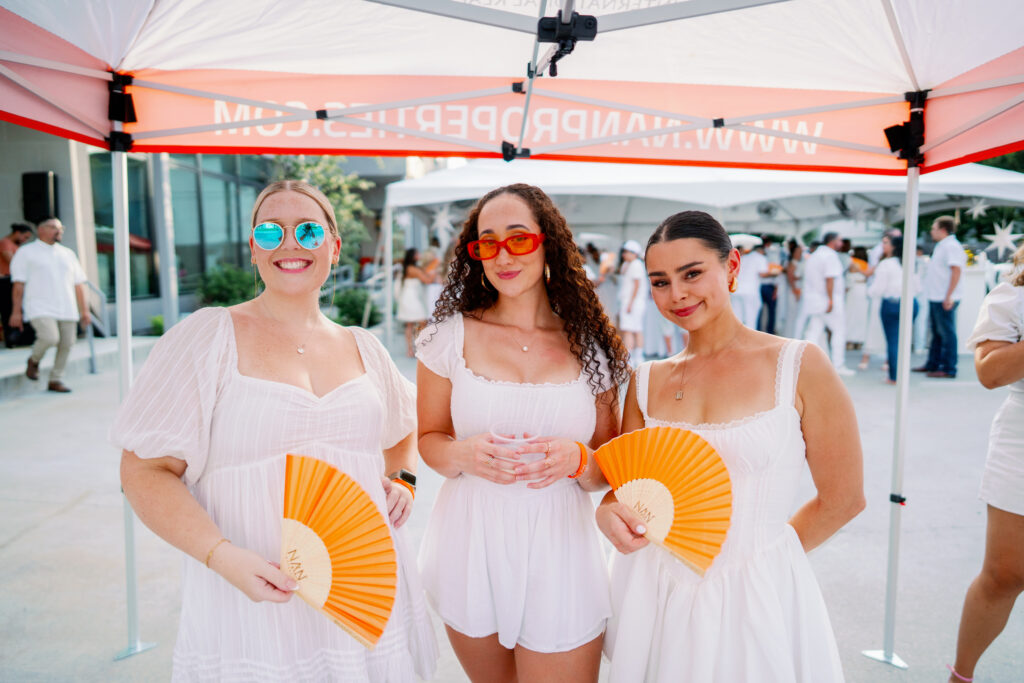 Blair Lamont, Alanna Gustin, Chloé Detchessahar at Nan & Company Properties' White Linen Night in The Heights soirée.