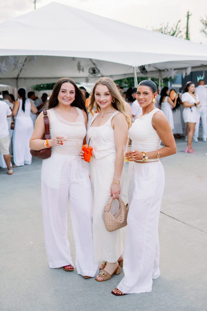Lyndi, Danielle and Shae Johnson at Nan & Company Properties' White Linen Night in the Heights soirée.