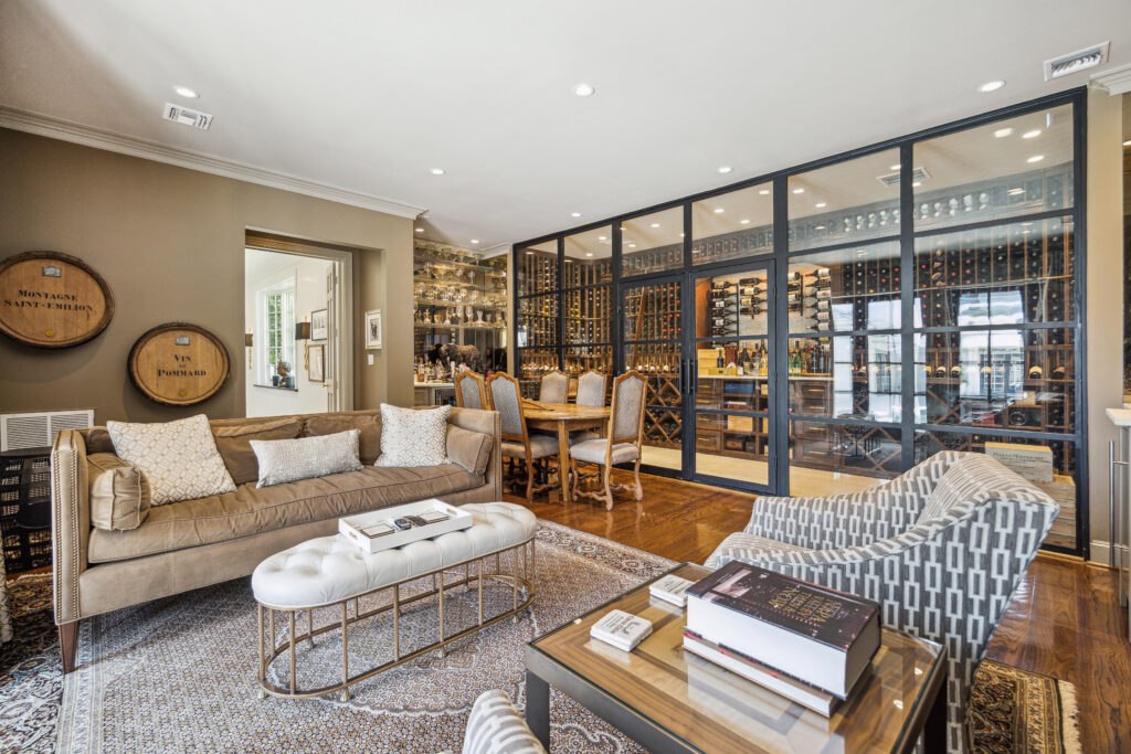 The glass-walled wine room looks into the study where Governor John B. Connally and wife Nellie once huddled. (Photo by TK Images for Compass)