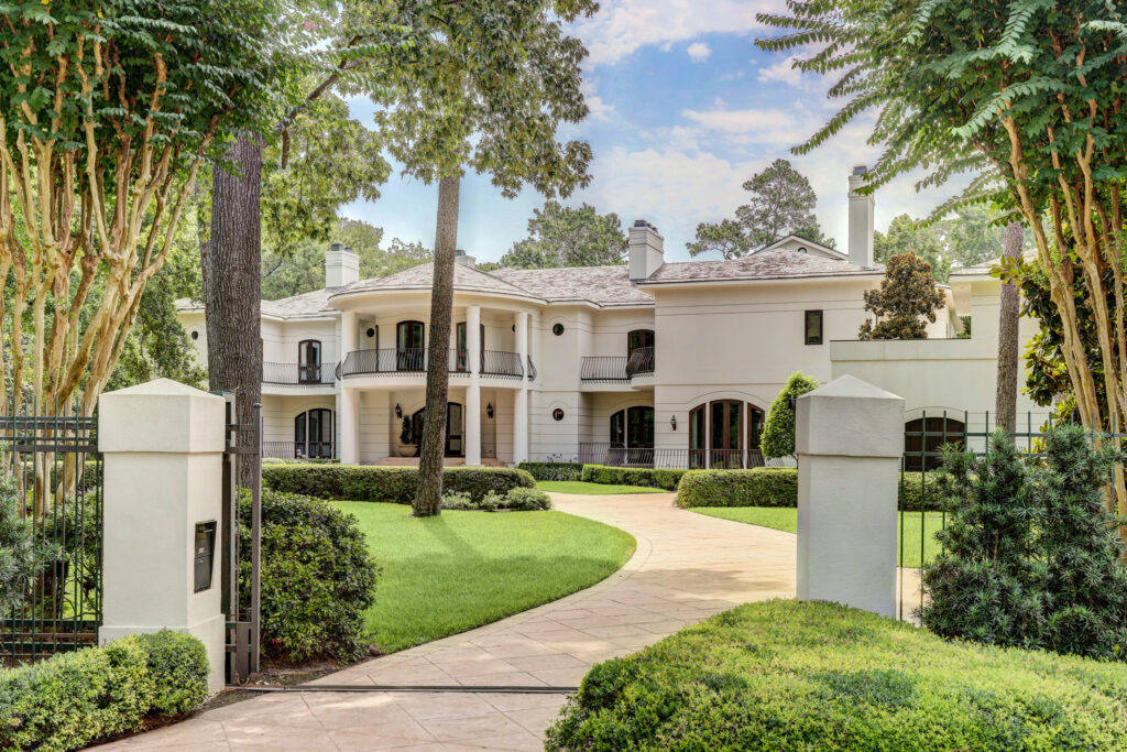 The 14,400 sq.ft. home at 324 Buckingham Drive boasts a to-die-for lap pool and a serious workout room. (Photo by TK Images for Compass.