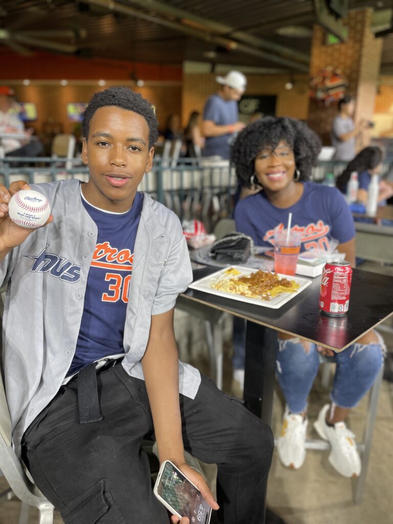 This Astros fan left with a signed Kyle Tucker ball and lots of memories from this Houston Hospice benefit. (Courtesy Houston Hospice)