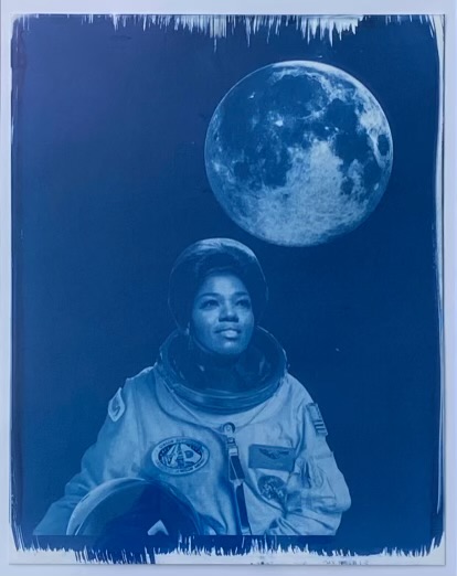 J.E.T.’s Space City Diva, 2024, is a collaboration between artists Tierney Malone and Jehnifer Henderson. The image honors Mrs. Jewel Brown who had a storied career traveling the world with Louis Armstrong and his orchestra.