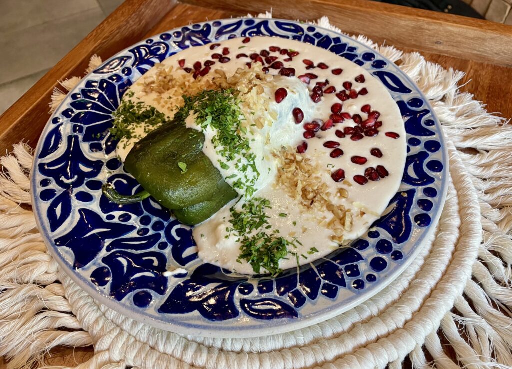 Don Artemio’s Festival del Chile en Nogada. The special dish is served on handmade talavera plates. (Photo by Courtney Dabney)