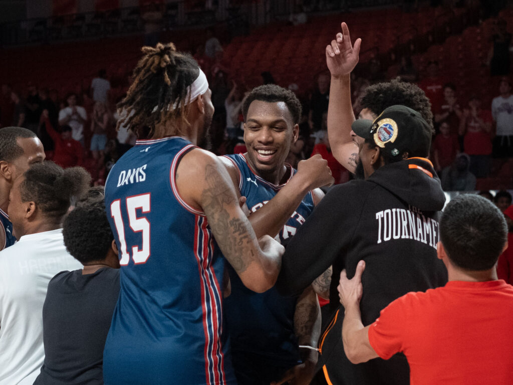 Fabian White Jr. and the Forever Coogs celebrate a win in the $1 million TBT tourney. (Photo by F. Carter Smith)