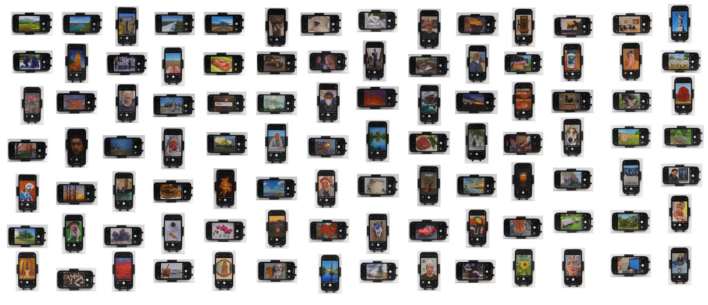John Slaby's "Through The Phone," 2022 features 100 small wooden paintings of iPhones. (Photo courtesy of Archway Gallery)