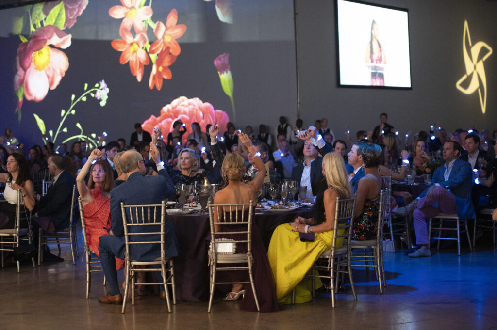 2024 Chairs and their table guests engage in the mission moment (Photo by Tamytha Cameron)