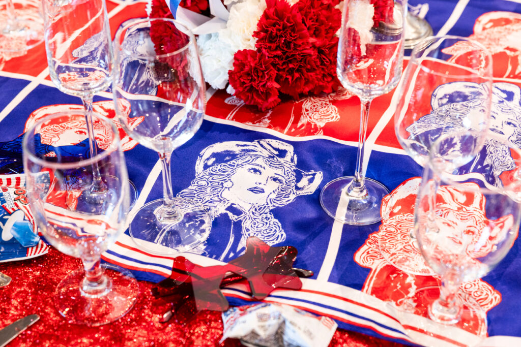 Limited edition event scarf with art by fashion illustrator, Kelsey Linnartz. (Photo by Ellman Photography)