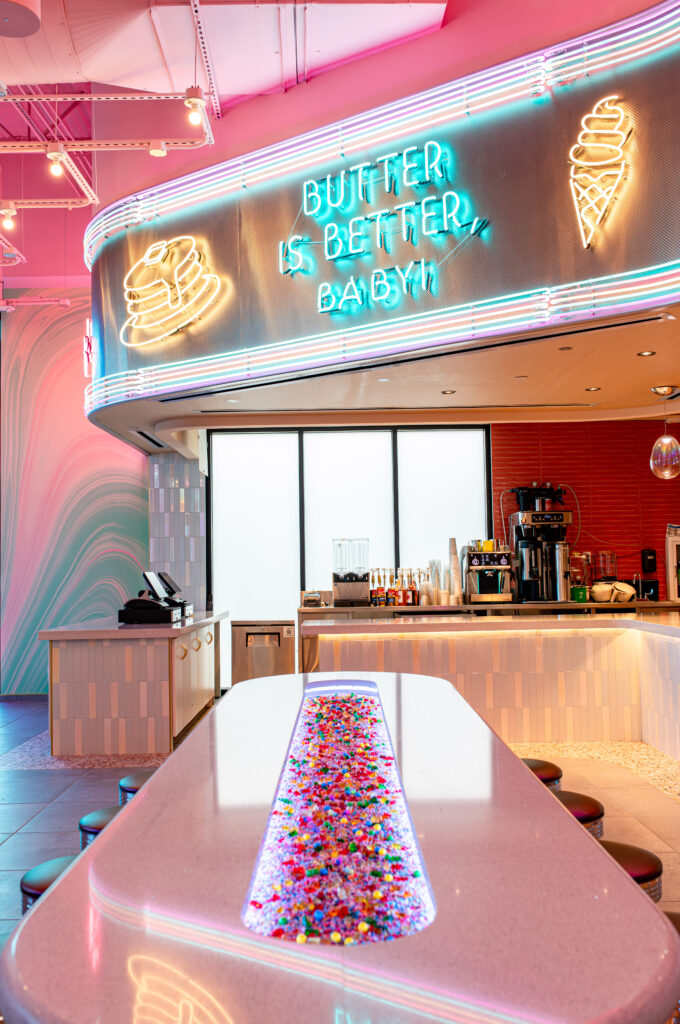 Delight in the ice cream counter paved through its center with a river of rainbow sprinkles designed with Gail McCleese of Sensitori and the New York-based design studio ICRAVE. Photo by Kirsten Gilliam.