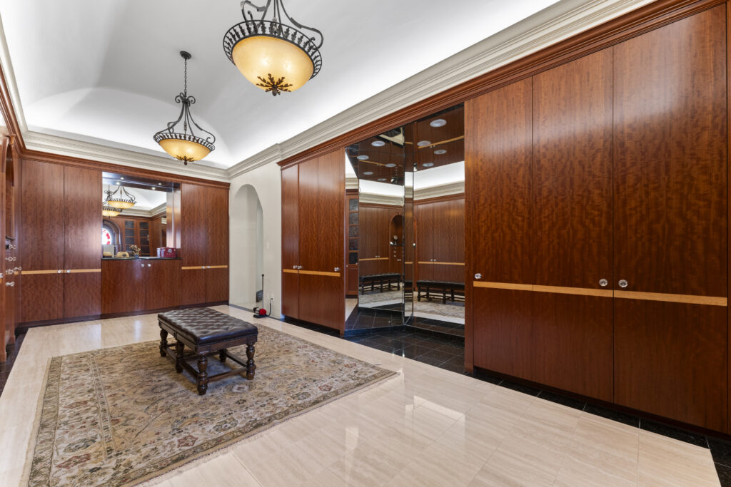 One of two primary closets  at 401 Lakeshore Drive in El Lago, Texas.  (Photo by Iconic Images)