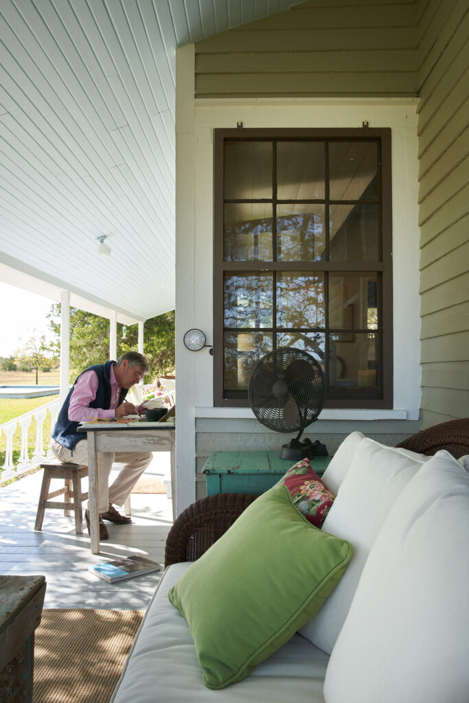Bill Curtis at work on the porch of the farm. (Photography Pär Bengtsson)