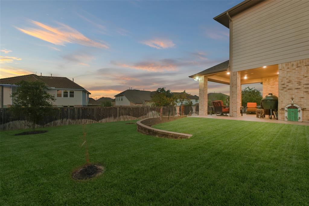 The property's oversized lot offers plenty of backyard potential. 