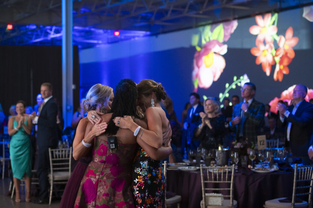 Courtney Gilbert, Irish Burch, Amy Grissen, and Holly Lawrence connect offstage (Photo by Tamytha Cameron)
