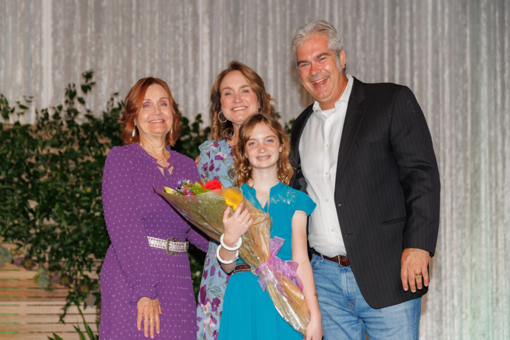 Dylan Crews, center, with her family at the Inspiration Ranch gala at The Woodlands Waterway Marriott. (Photo by Gerri Francis)