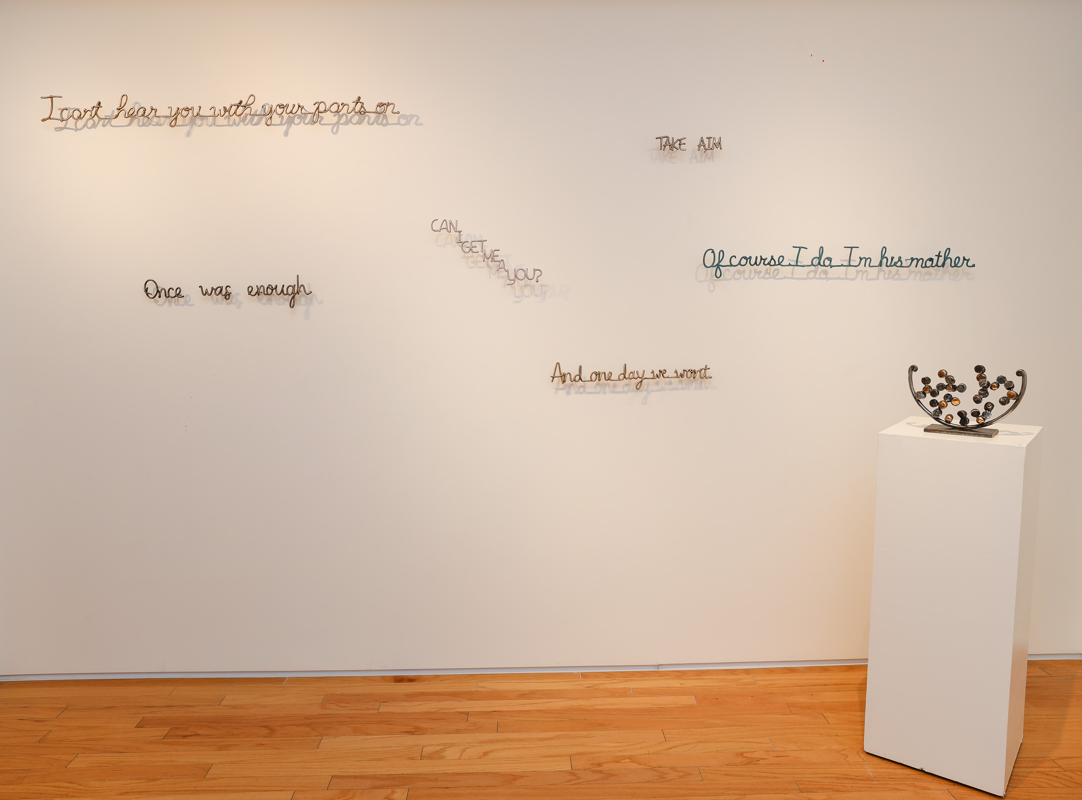 Cast Bronze Phrases by Tara Conley is featured in "Lost and Found" exhibition. (Photo by Ken Eke)