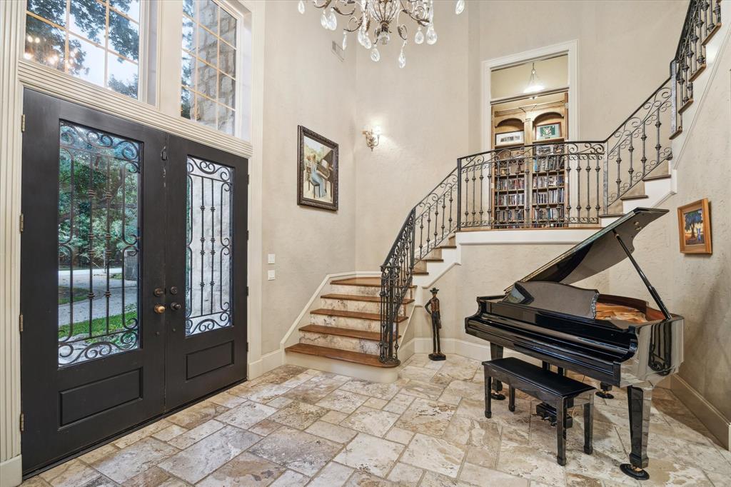 A spacious entryway greets guests to this private and luxurious estate. 