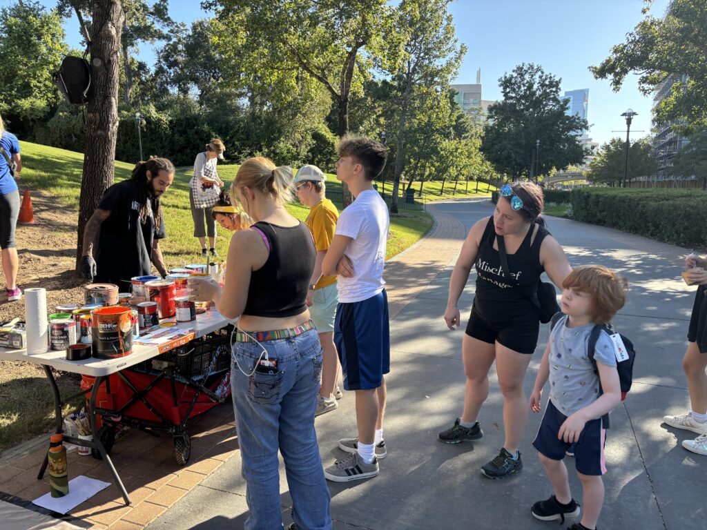Community members got to select the paint color and location for their contribution to the 50th anniversary mural, just off The Waterway.
