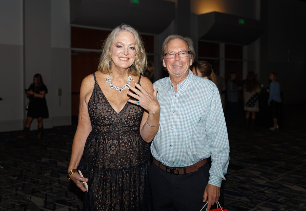 MG Tindall with jeweler Mark Pharo, modeling the ring he donated to the live auction at the gala. (Photo by Gerri Francis)