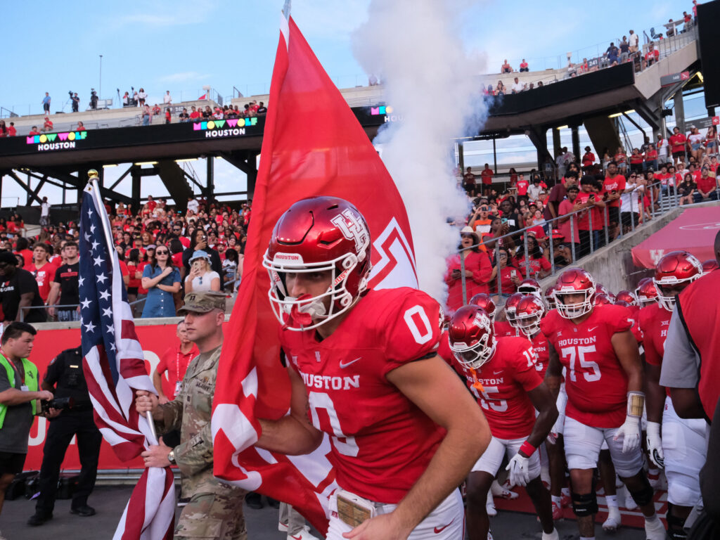 Joseph Manjack carried the flag for the University of Houston. (Photo by F. Carter Smith)