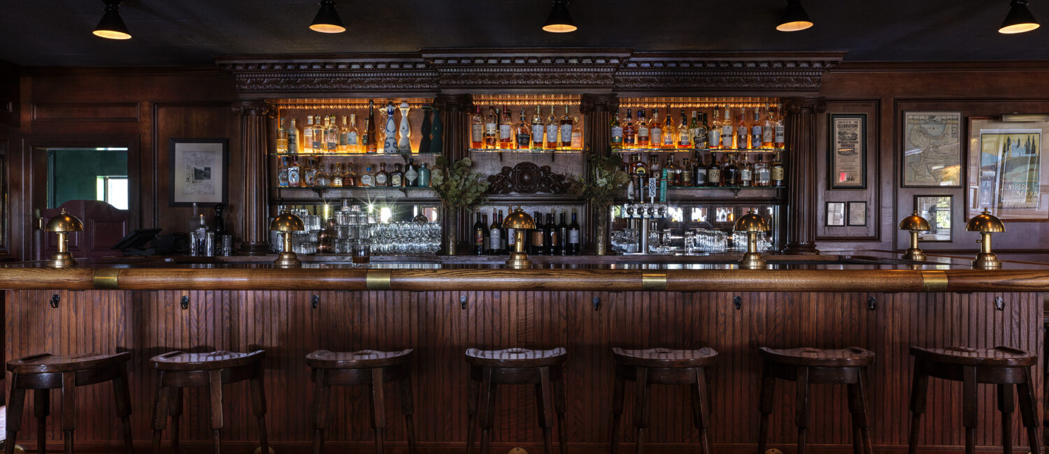 The bar at La Playa Hotel fits its artist’s retreat and bohemian playground history. (Photo by Chris Mottalini)