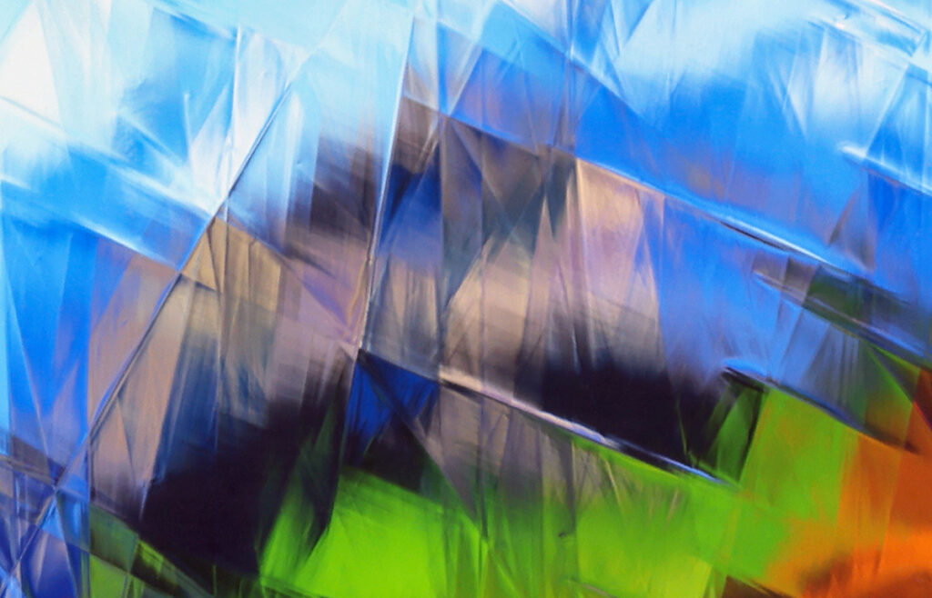 "Metropolis" by Larry Garmezy uses 17th-century glass and photography to mimic cubist paintings.