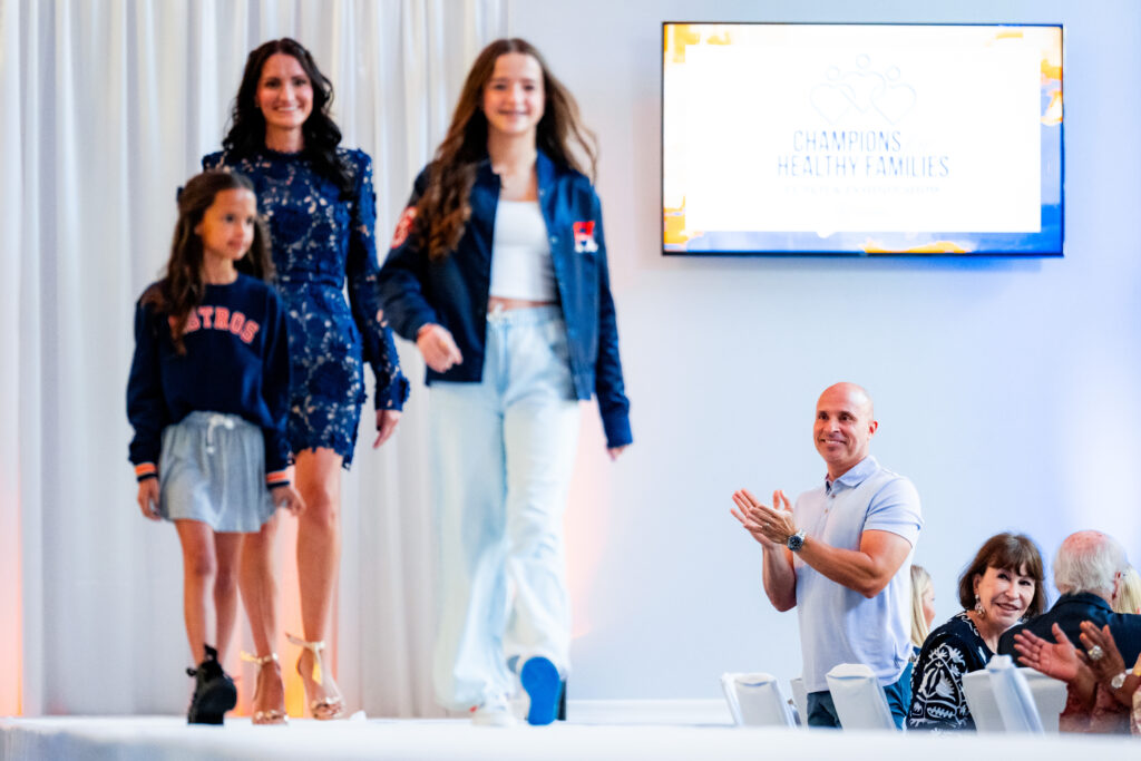 Pamela Espada and her daughters Eliana and Viviana walked the runway as proud dad Astros manager Joe Espada cheered them on. (Courtesy Houston Astros)