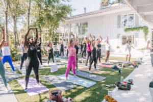 Attendees exercise their bodies and minds during mat pilates and wellness chats at PaperCity's Nourish retreat. (Photo by Heather Robards)