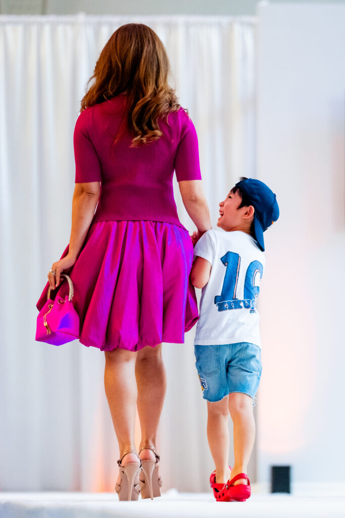 Rumi Kikuchi and her son Leo charmed the crowd at the Astros Foundation fashion show and luncheon. (Courtesy Houston Astros)