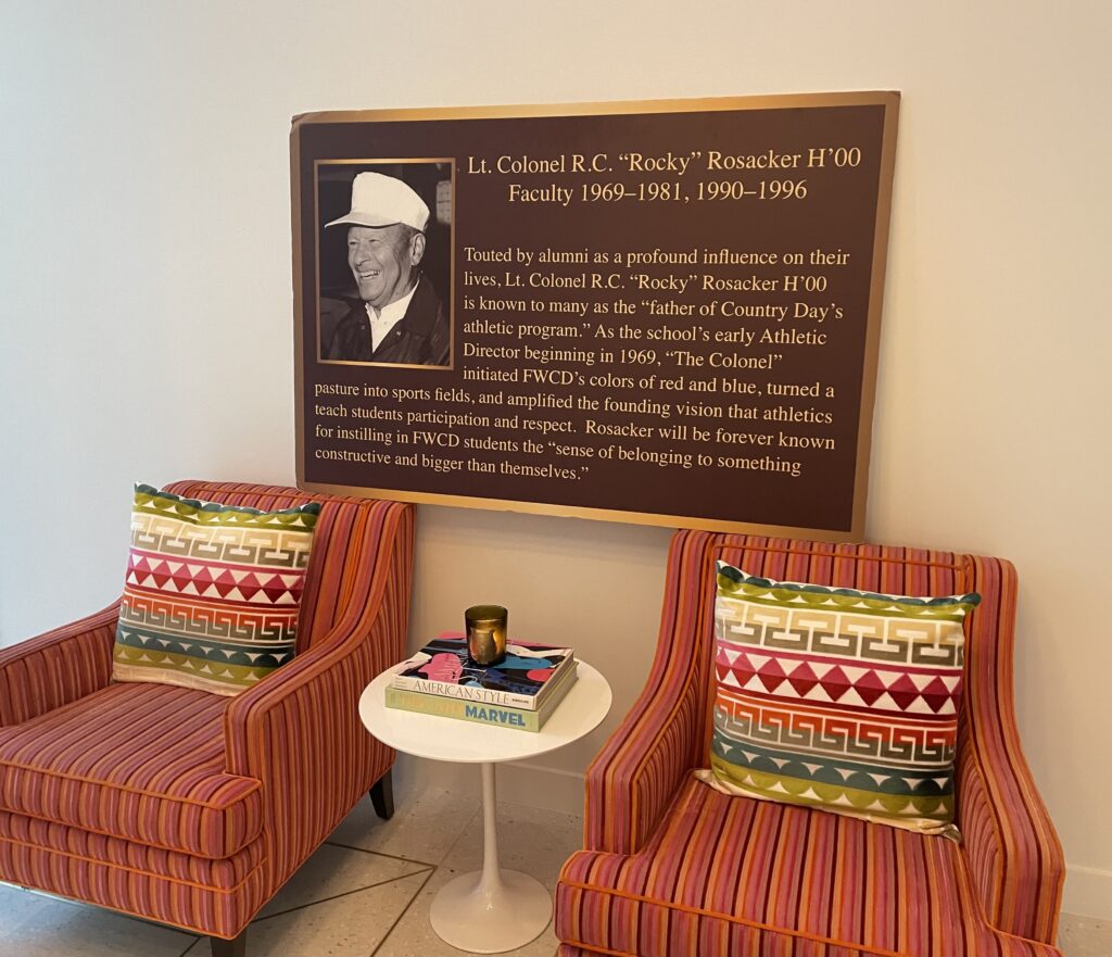 A copy of the memorial plaque at Fort Worth Country Day spells out why The Colonel was a legend. (Photo by Courtney Dabney)