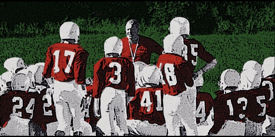 The Colonel with his team in 1969. Grown men still get choked up recalling him.