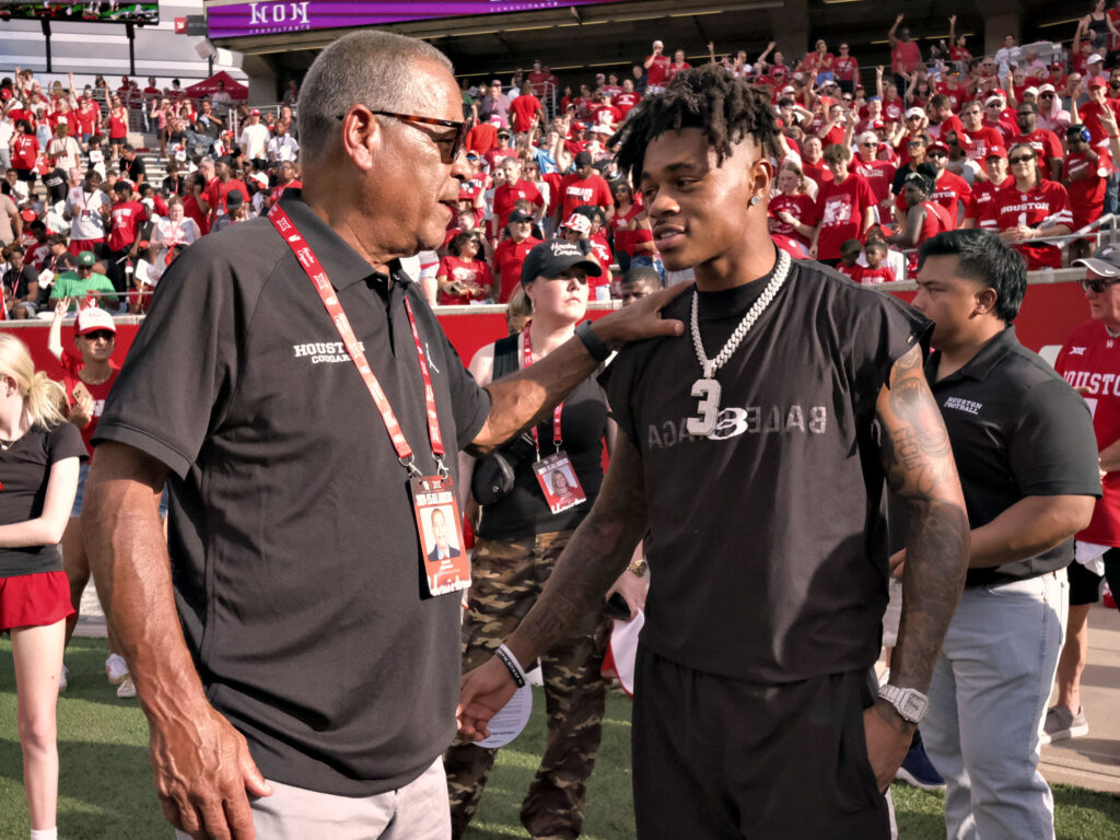University of Houston basketball coach Kelvin Sampson and Coog turned Texans star Tank Dell share an easy bond. (Photo by F. Carter Smith)