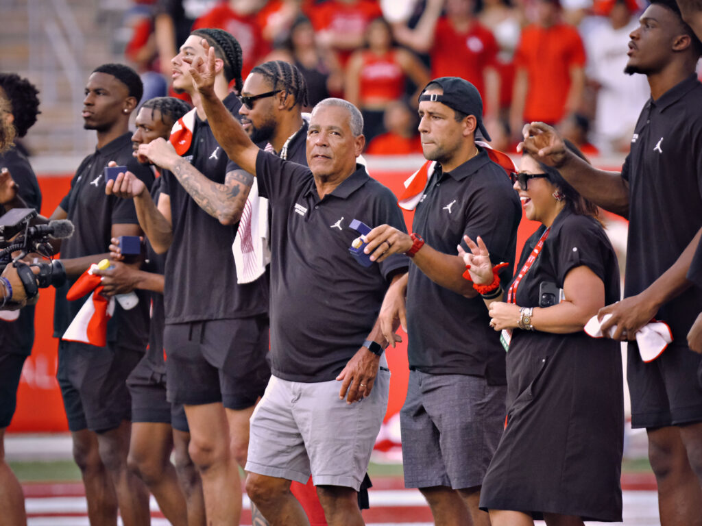 Kelvin Sampson's Big 12 champions — which forever will be the first Big 12 champs ever at UH — received their rings (with a special Reggie Chaney homage) and got honored on the field during Willie Fritz's first game as the University of Houston's football coach. (Photo by F. Carter Smith)