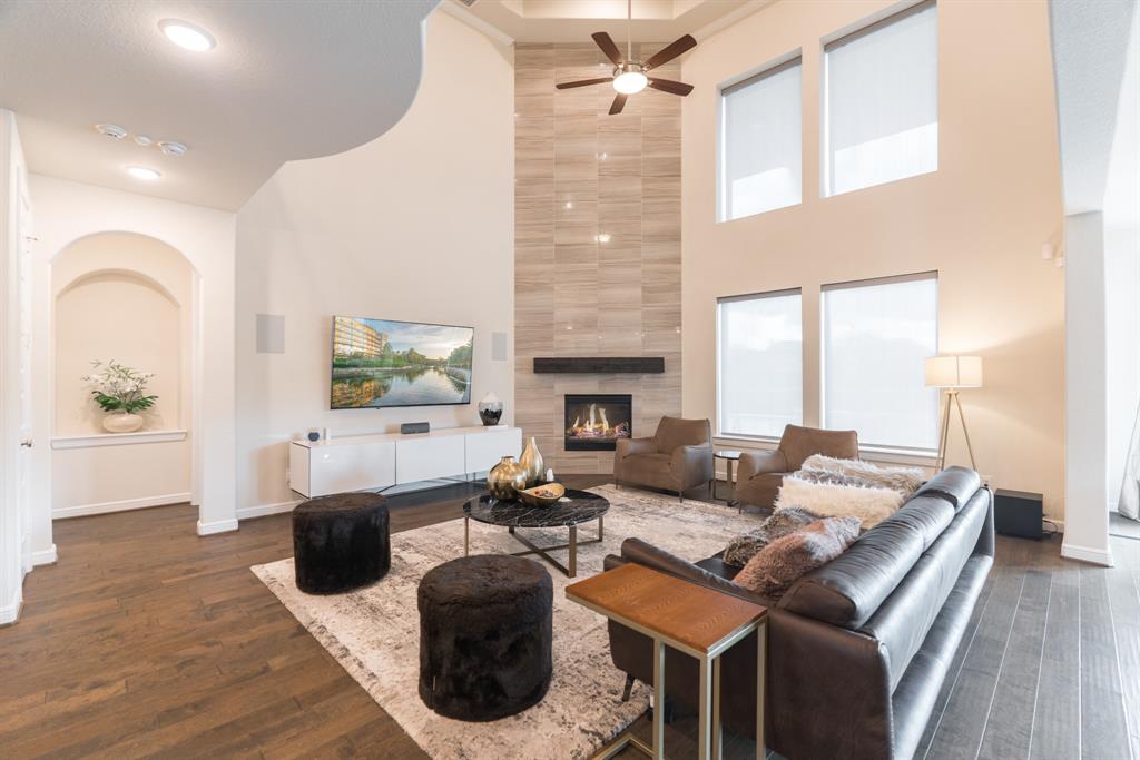 The tall ceilings inside the home allow for plenty of natural sunlight to brighten the living space. 