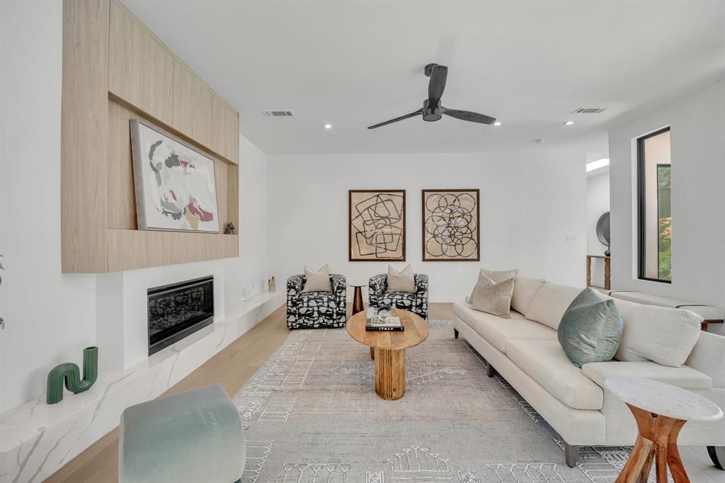 The homes features offers a first-floor primary suite with direct courtyard access.