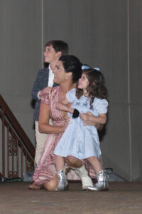 George, Claire, and Caroline Phillips honoring the late Kace Phillips (Photo by Tamytha Cameron and Celeste Cass)