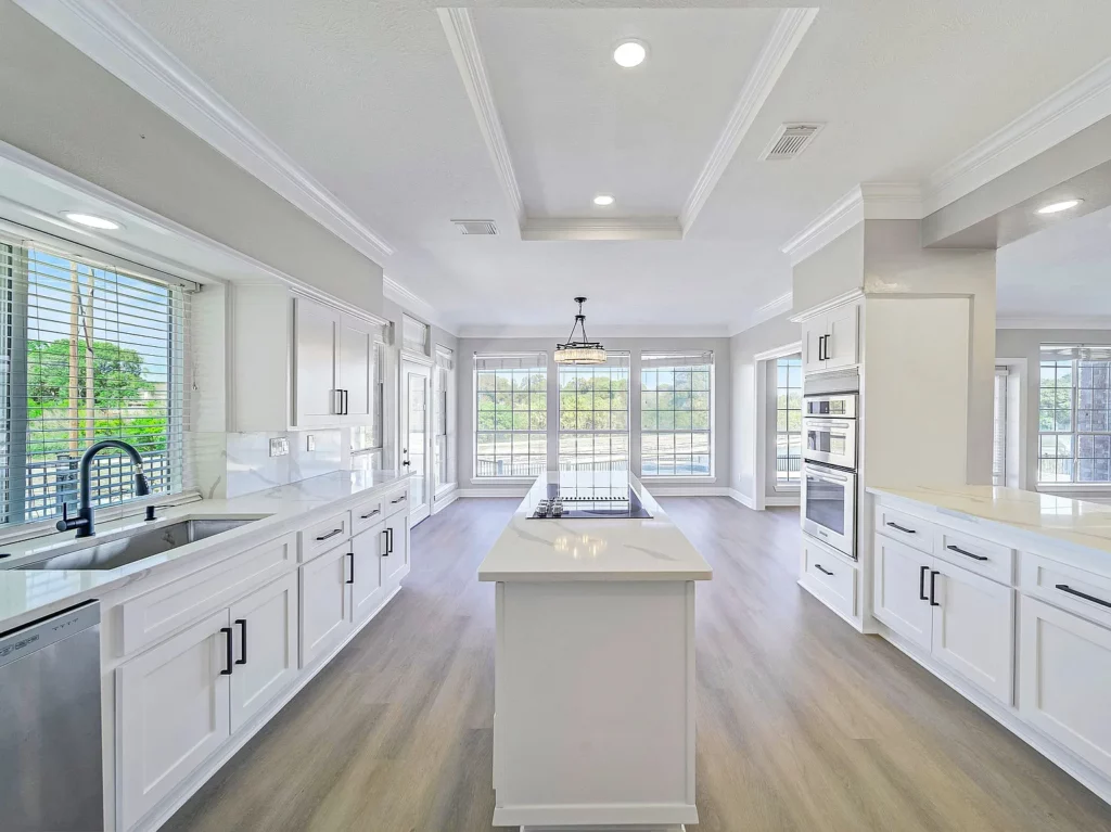 3007 Waterway Court has a linear kitchen that is open to the living room and eat in kitchen with a stunning view to the canal.