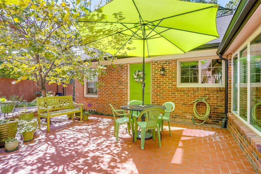 3241 Westcliff Road West, the back patio reveals the historic home's charm.