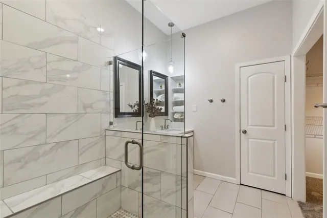 817 North Dove Road's walk in shower in the primary ensuite.