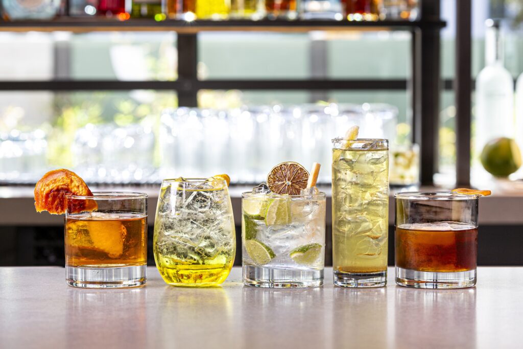 Sip on globally-inspired cocktails at Traveler's Cart, where drinks like The Italian Job and Slumdog Millionaire offer a refreshing twist on classic favorites. (Photo by Jenn Duncan)