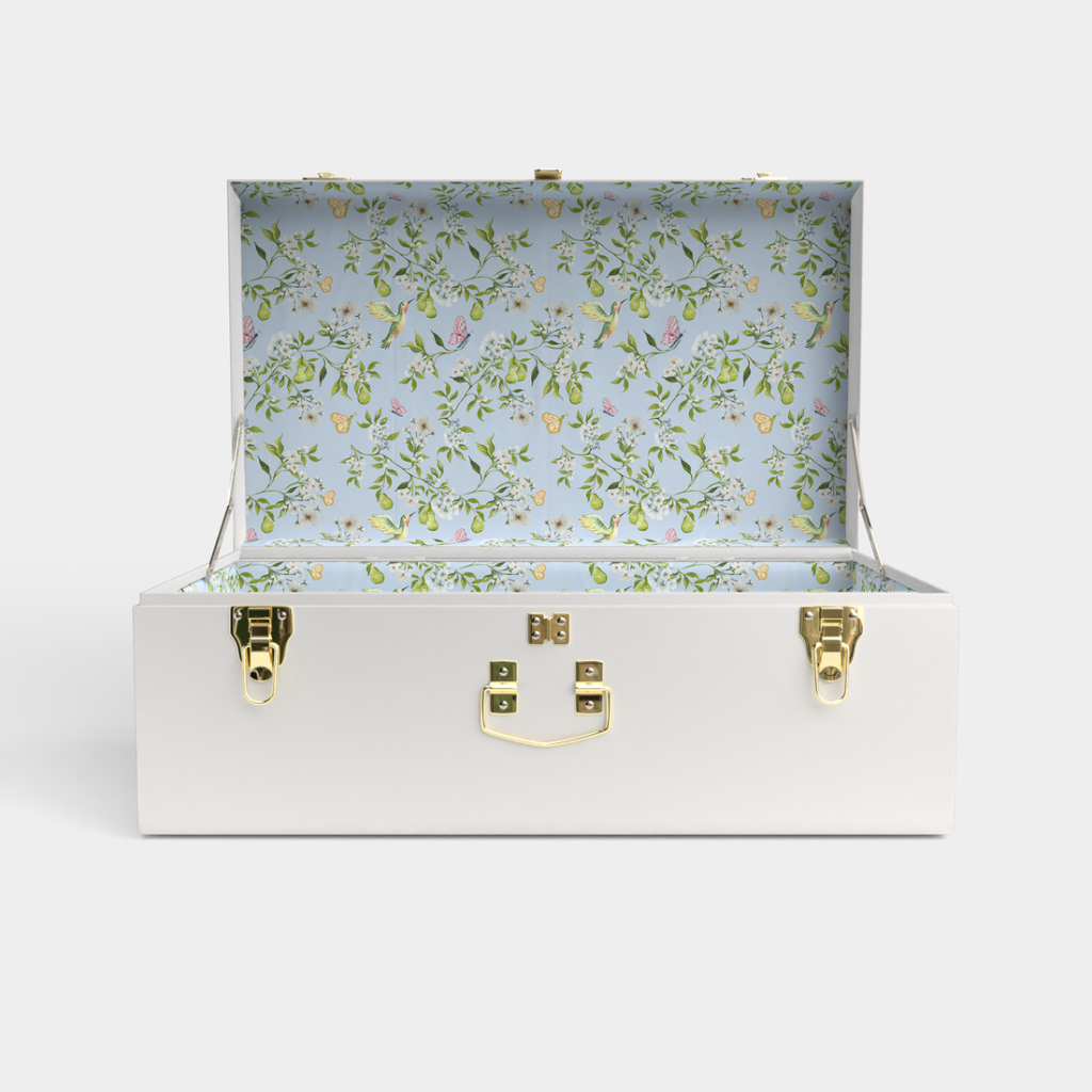 The Classic Trunk Bundle is handcrafted and fully customizable, perfect for preserving treasured heirlooms. (Photo courtesy Petite Keep)