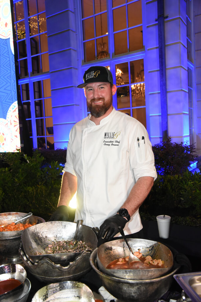 Willie G's executive chef overseeing one of several buffet lines during the Houston Police Foundation True Blue fundraiser  (Photo by Alexander's Fine Portrait Design )