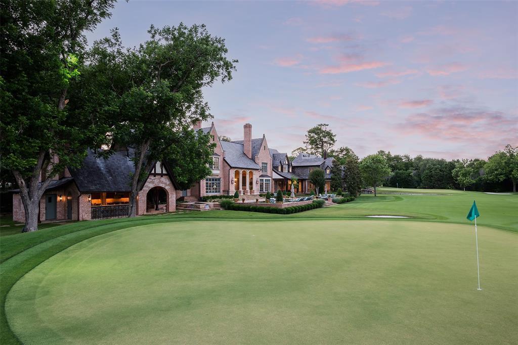 Golf lovers will enjoy the two-hole regulation golf course (with sand traps and water features) in the backyard. (Courtesy)