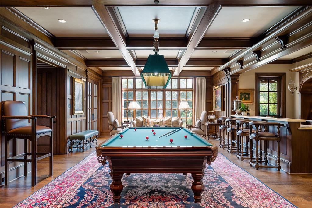 10540 Lennox Lane is an entertainer's paradise with a golf simulator and three game rooms. (Courtesy)