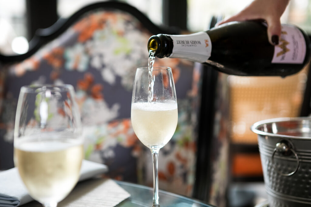 A glass of bubbly comes with each guest’s afternoon tea, priced at $65 per person. (Photo by Tracy Ling)